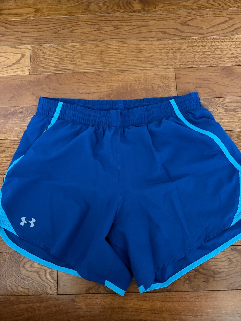 Under Armour Women's Royal Blue Athletic Shorts with Light Blue Trim
